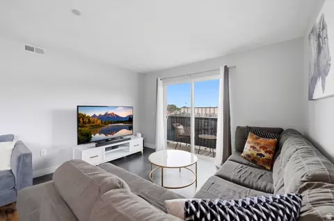 Living - 116 E Resaca Dr S # F6, Sandy, UT 84070 photo 1 of 2