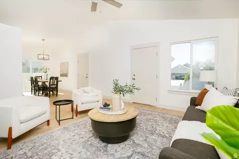 Living - 1648 E Slow Water Way N, Eagle Mountain, UT 84005 photo 2 of 2