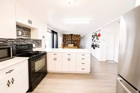 Kitchen - 305 W Elmo Rd, Elmo, UT 84521 photo 3 of 3