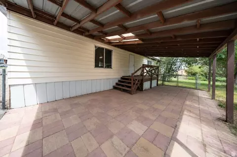 Exterior - 305 W Elmo Rd, Elmo, UT 84521 photo 1 of 2
