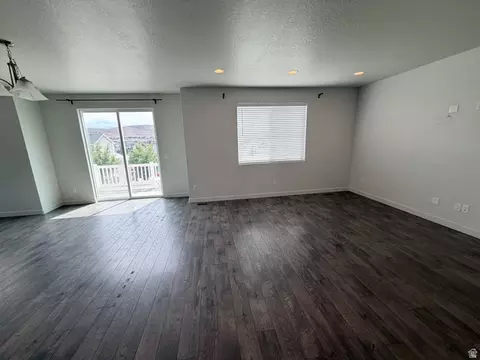 Living - 6366 N Wanlass Hl E, Eagle Mountain, UT 84005 photo 2 of 5