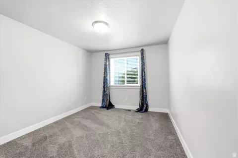 Bedroom - 3377 E Bridge St, Eagle Mountain, UT 84005 photo 4 of 5