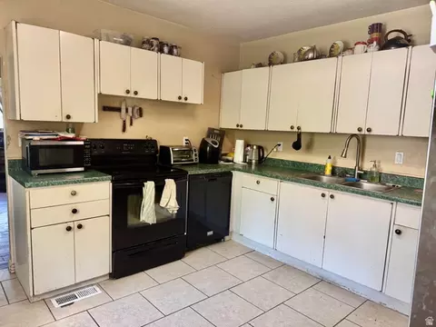 Kitchen - 470 E Center St, Logan, UT 84321 photo 1 of 2