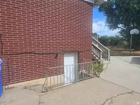 Exterior - 247 E Nicoletti Dr, Midvale, UT 84047 photo 4 of 8