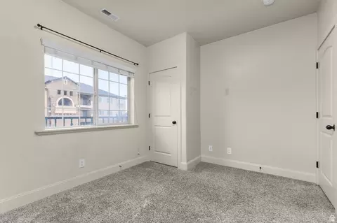 Bedroom - 3635 E Clear Rock Rd #L6, Eagle Mountain, UT 84005 photo 2 of 4