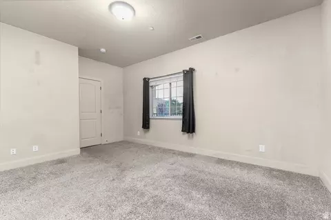 Bedroom - 3635 E Clear Rock Rd #L6, Eagle Mountain, UT 84005 photo 3 of 4