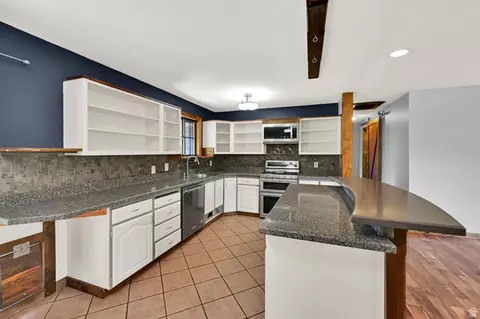 Kitchen - 2532 E Cliff Swallow Dr, Sandy, UT 84093 photo 2 of 3