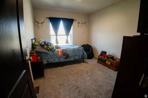 Bedroom - 8750 E Brushcreek Rd, Jensen, UT 84035 photo 1 of 17