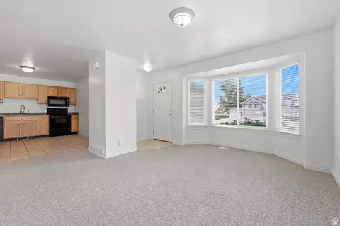 Living - 1884 E Shepard Ln, Lake Point, UT 84074 photo 2 of 4