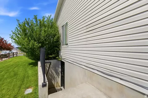 Exterior - 1884 E Shepard Ln, Lake Point, UT 84074 photo 6 of 11