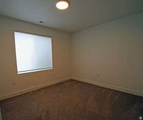 Bedroom - 655 E Oliver Rd, Tooele, UT 84074 photo 2 of 5