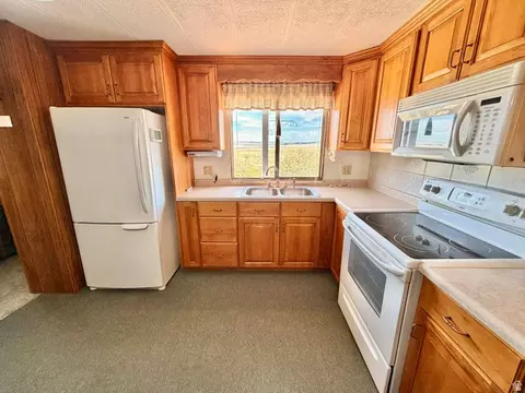 Kitchen - 910 E Clawson Bench Rd, Clawson, UT 84516 photo 3 of 8