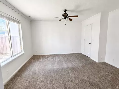 Living - 1320 E Raptor Rd, Eagle Mountain, UT 84005 photo 2 of 2
