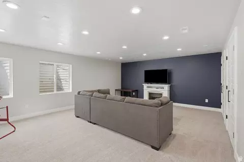 Living - 1422 E Lowe Peak Dr, Eagle Mountain, UT 84005 photo 4 of 5