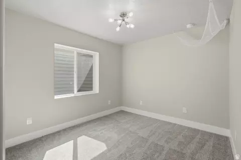 Bedroom - 1422 E Lowe Peak Dr, Eagle Mountain, UT 84005 photo 7 of 8