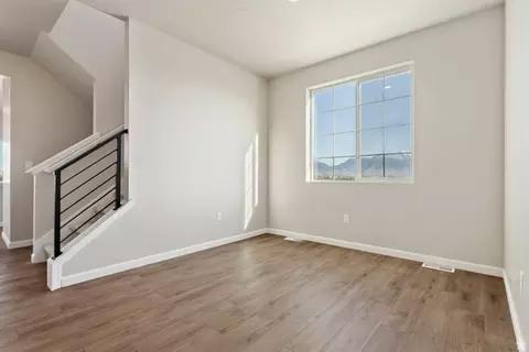 Living - 7102 N Cairns Way, Eagle Mountain, UT 84005 photo 2 of 9
