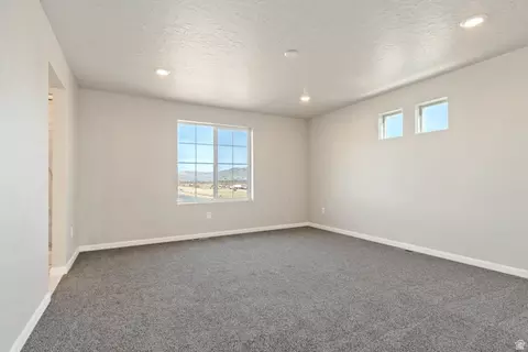 Living - 7102 N Cairns Way, Eagle Mountain, UT 84005 photo 9 of 9