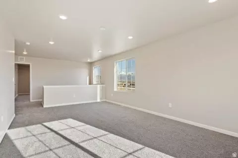 Living - 7102 N Cairns Way, Eagle Mountain, UT 84005 photo 7 of 9