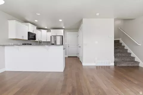 Living - 1848 E American Way #3, Eagle Mountain, UT 84005 photo 2 of 2