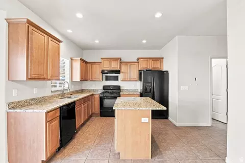 Kitchen - 7725 N Willow Ln E, Eagle Mountain, UT 84005 photo 2 of 3