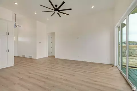 Living - 8077 N Bristle Cone Rd, Eagle Mountain, UT 84005 photo 3 of 5