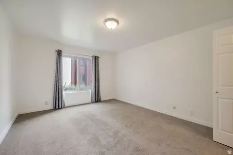 Bedroom - 5572 S Marshwood Ln #E, Murray, UT 84107 photo 2 of 6