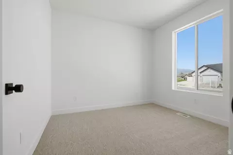 Bedroom - 2266 E Morning Glory Way #437, Eagle Mountain, UT 84005 photo 2 of 4