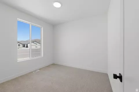 Bedroom - 2406 E Morning Glory Way #428, Eagle Mountain, UT 84005 photo 2 of 3