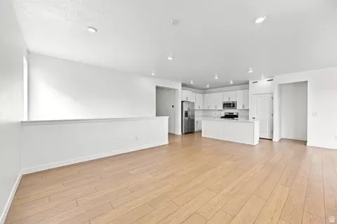 Living - 1736 E Chukar Dr N, Eagle Mountain, UT 84005 photo 3 of 5