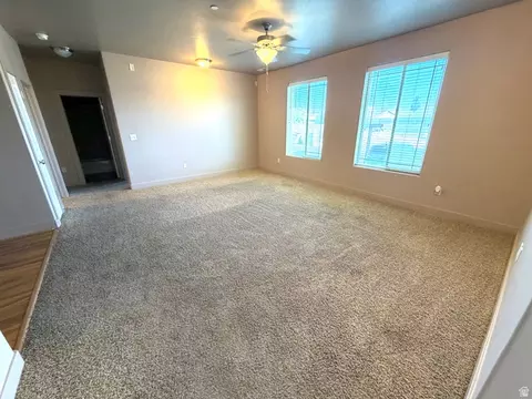 Living - 3618 E Clear Rock Rd # 2, Eagle Mountain, UT 84005 photo 2 of 3