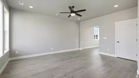 Living - 3385 E Baywater Dr, Eagle Mountain, UT 84005 photo 2 of 2