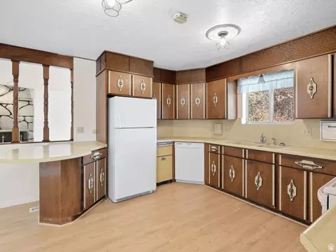 Kitchen - 6082 S Main St, Murray, UT 84107 photo 3 of 4