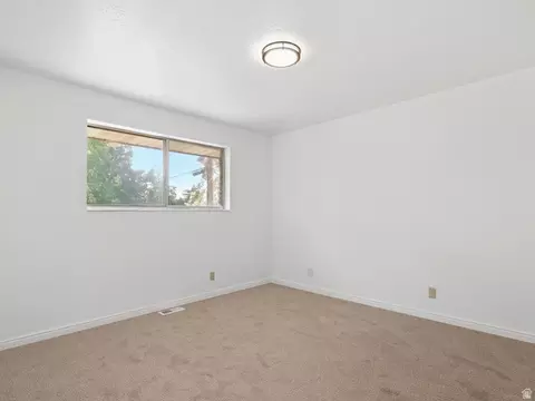 Bedroom - 6082 S Main St, Murray, UT 84107 photo 2 of 5
