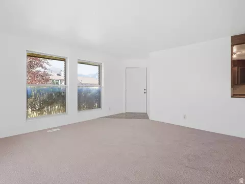 Living - 6082 S Main St, Murray, UT 84107 photo 1 of 8