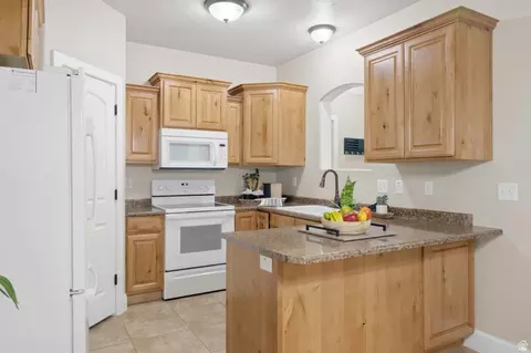 Kitchen - 3689 E Rock Creek Rd #N1, Eagle Mountain, UT 84005 photo 2 of 5
