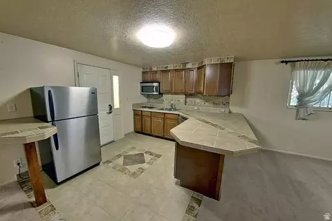 Kitchen - 1482 E 4600 S, Ogden, UT 84403 photo 3 of 3