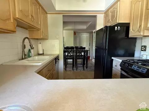 Kitchen - 1533 E Waterbury Dr Apt L S, Murray, UT 84121 photo 3 of 5