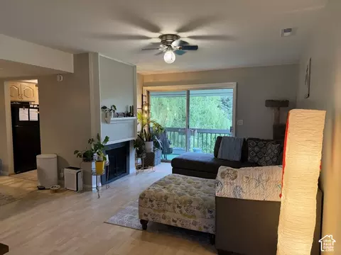 Living - 1533 E Waterbury Dr Apt L S, Murray, UT 84121 photo 2 of 3