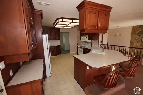 Kitchen - 1140 Windsor Dr, River Heights, UT 84321 photo 2 of 6