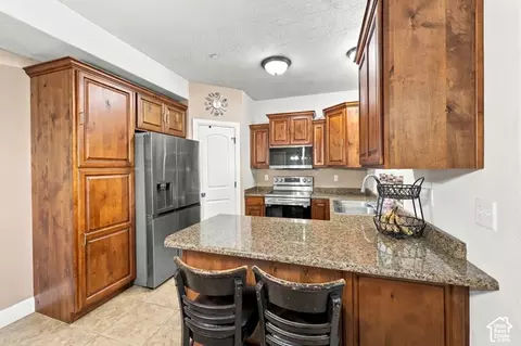 Kitchen - 3689 E Rockcreek Rd N #N3, Eagle Mountain, UT 84005 photo 4 of 4