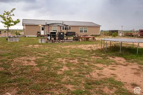 Exterior - 15079 E 5500 S, Randlett, UT 84063 photo 14 of 26