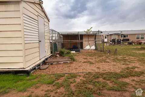Exterior - 15079 E 5500 S, Randlett, UT 84063 photo 11 of 26