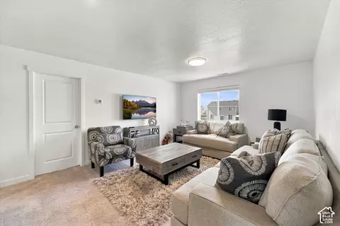 Living - 7939 N Seattle Slew Rd, Eagle Mountain, UT 84005 photo 2 of 2