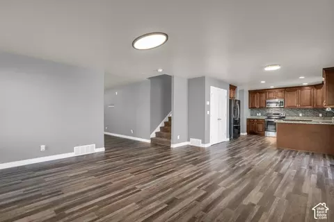 Living - 4689 N Conestoga Way, Eagle Mountain, UT 84005 photo 5 of 7