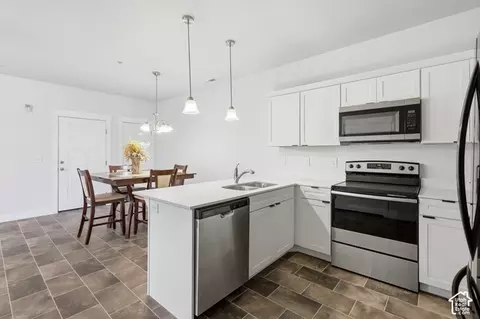 Kitchen - 13536 S Poole Dr #E202, Riverton, UT 84096 photo 3 of 4