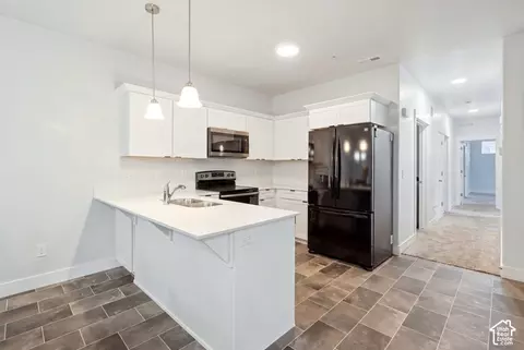 Kitchen - 13536 S Poole Dr #E202, Riverton, UT 84096 photo 1 of 4