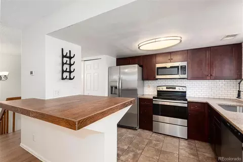 Kitchen - 12513 E Pacific Cir #D, Aurora, CO 80014 photo 2 of 5