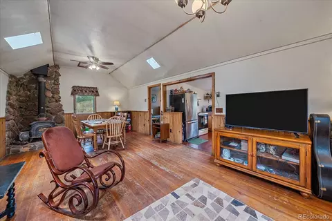 Living - 28321 Shadow Mountain Dr, Conifer, CO 80433 photo 1 of 1