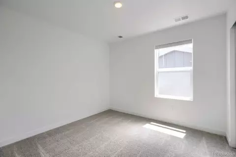 Bedroom - 1678 Drumming Dr, Windsor, CO 80550 photo 2 of 2