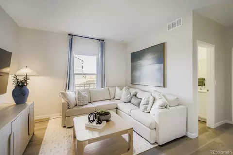 Living - 1678 Drumming Dr, Windsor, CO 80550 photo 2 of 2